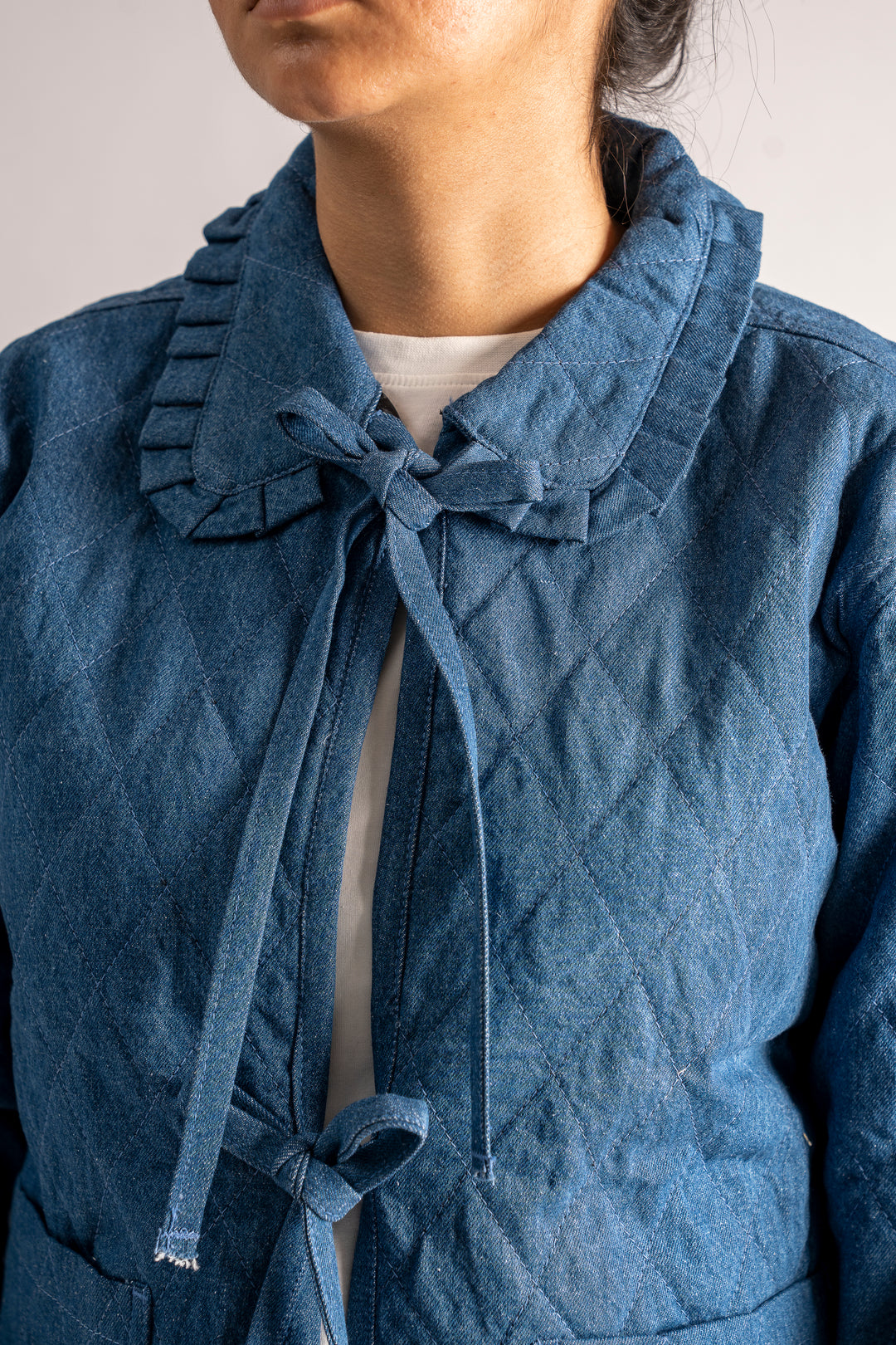 Quilted jacket with tie front